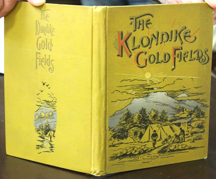 Item #B2518 The Klondike Gold Fields, Containing a Full Account of the Discovery of Gold in Alaska and the Northwest Territories; Enormous Deposites of the Precious Metal; Routes Traversed by Miners; How to Mine for Gold; Camp Life at Klondike. A C. Harris.
